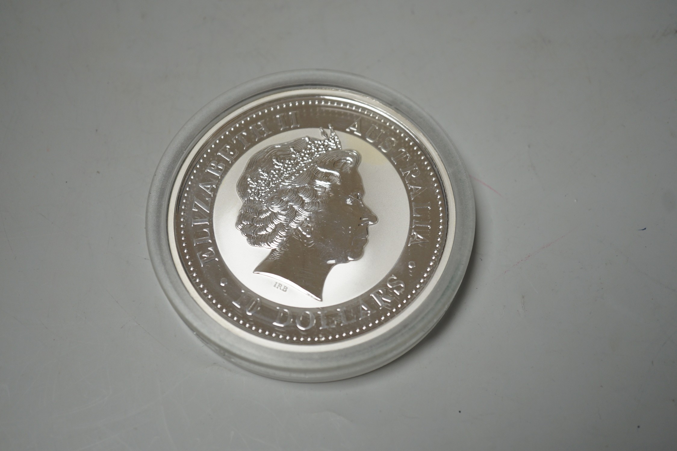A group of boxed collector's coins